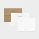 Personalized blush heart note card with return-addressed envelopes in white and kraft, featuring one red accent heart.
