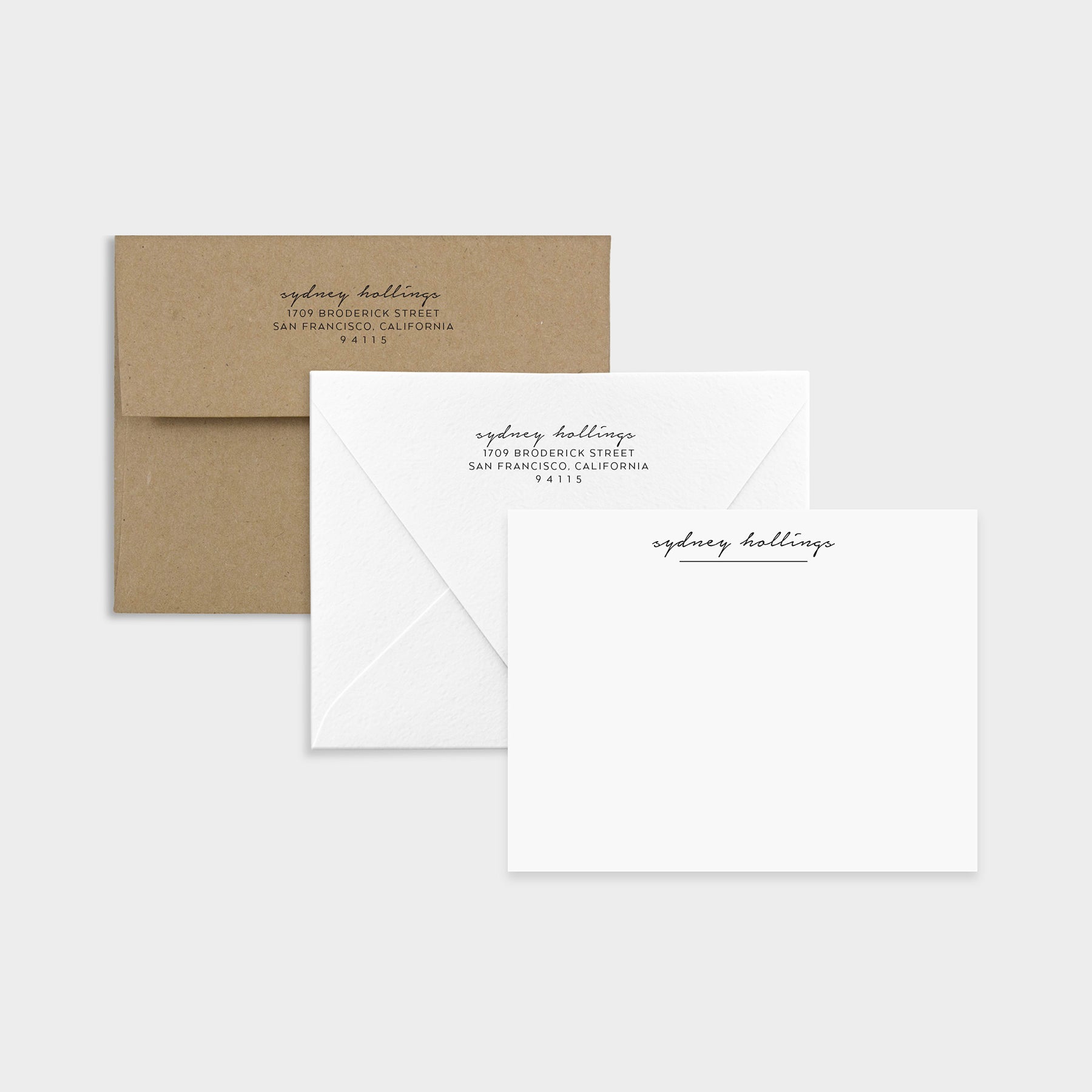 Personalized stationery set with elegant script name and return-addressed envelopes in white and kraft.